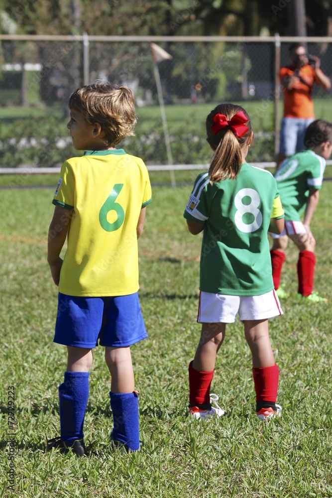 Fototapeta premium Kids playing soccer