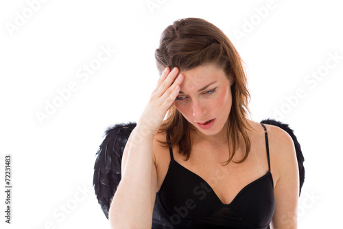 model isolated on plain background ashamed hiding face in hand