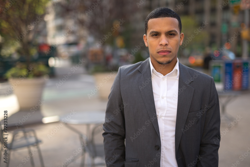 Young African American black Latino man serious face