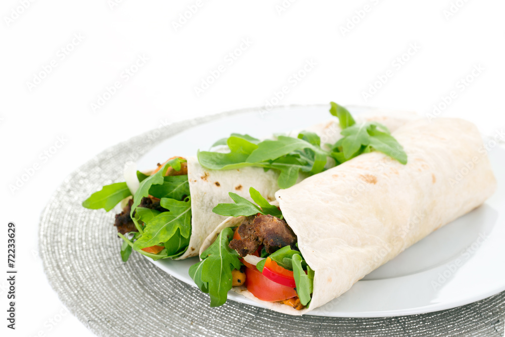 Two warps served with meat and vegetables. Two warps served with meat and vegetables.