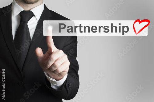 businessman pushing flat button partnership heart symbol