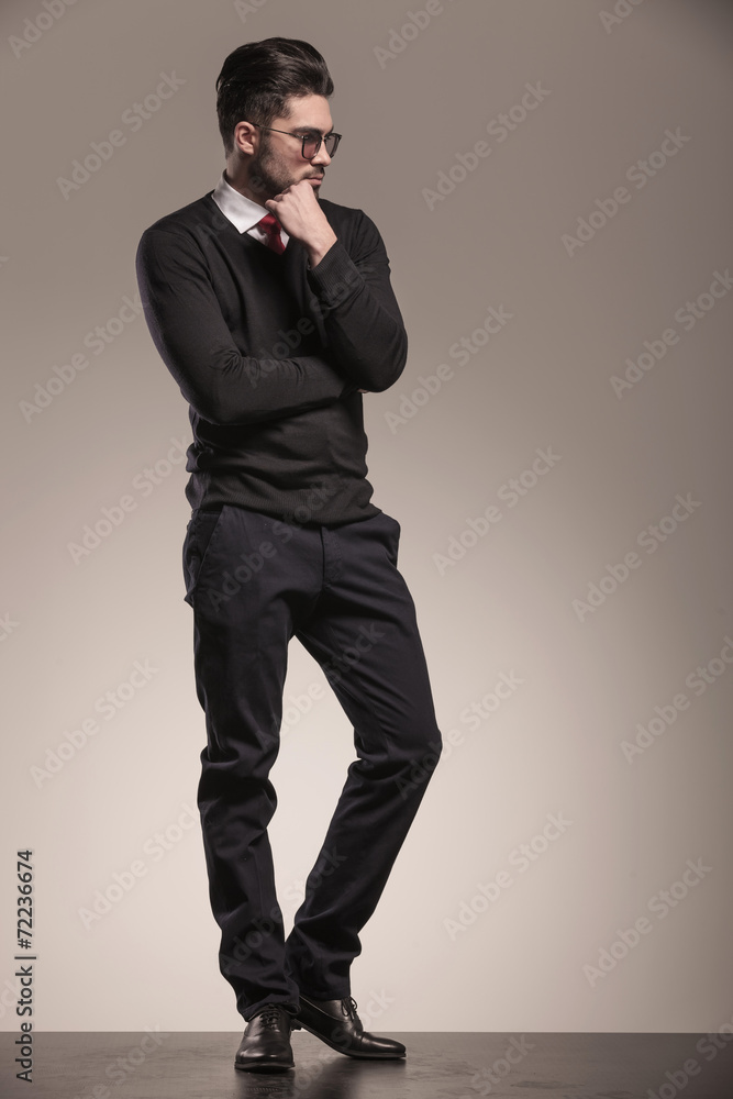 Full length picture of a handsome business man thinking. Full length picture of a handsome business man thinking.
