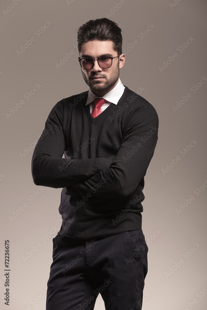 Fototapeta premium Handsome business man holding his arms crossed