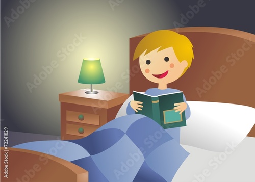 Niño leyendo en la cama