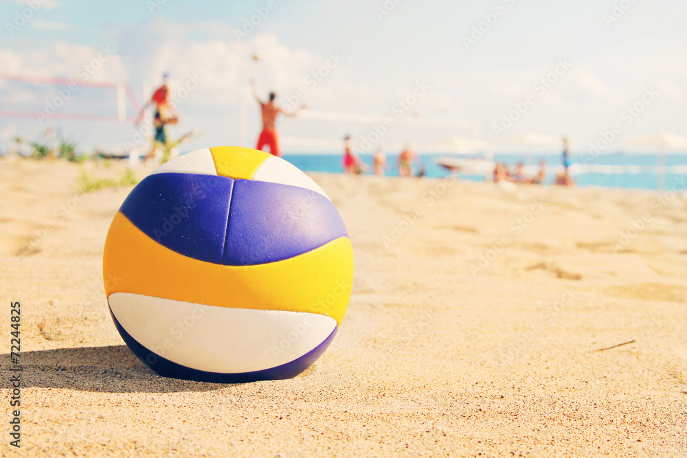 beach volleyball ball in sands - obrazy, fototapety, plakaty 