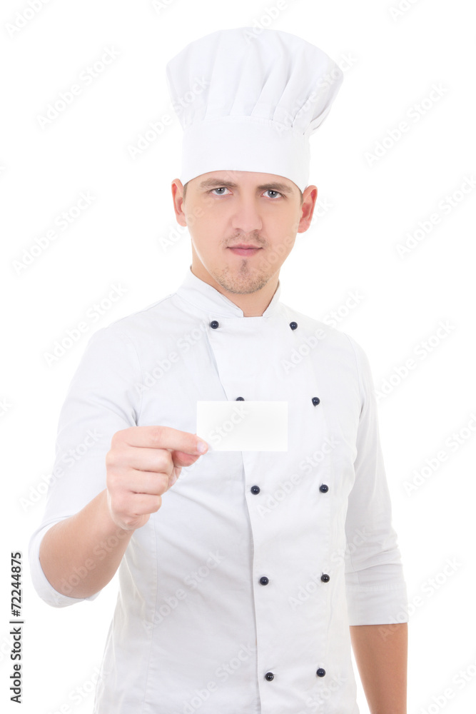 young man chef  in uniform showing blank visiting card isolated