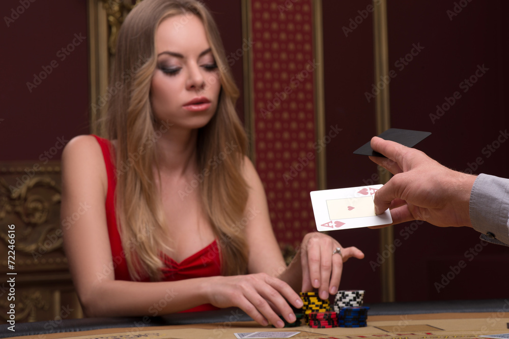 Handsome man and beautiful woman in casino Handsome man and beautiful woman in casino