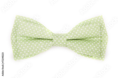 green bow tie with white polka dots