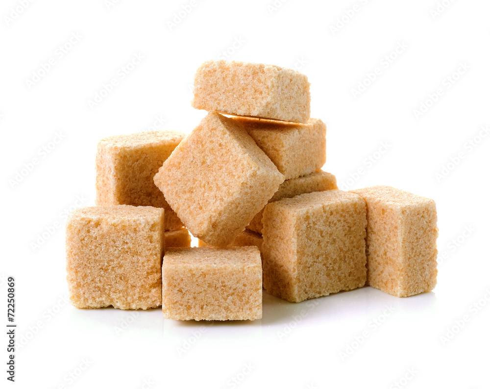 Cubes of cane sugar isolated on white background