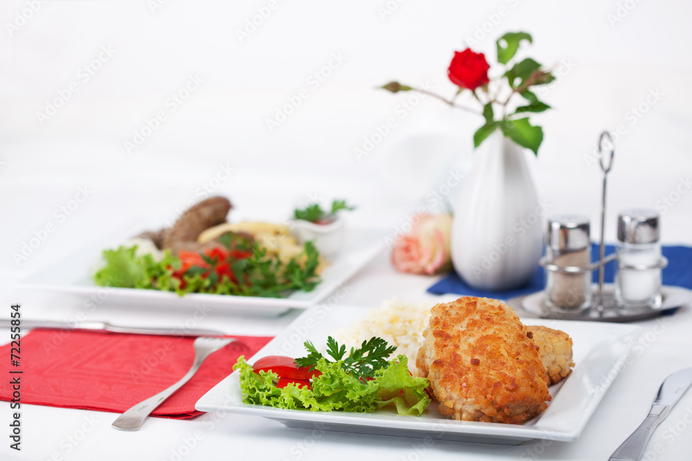 cutlet with garnish on a table