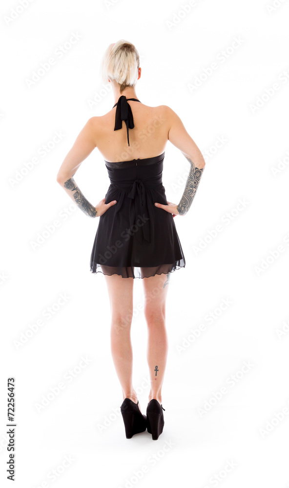 model isolated on plain background back hands on hips model isolated on plain background back hands on hips