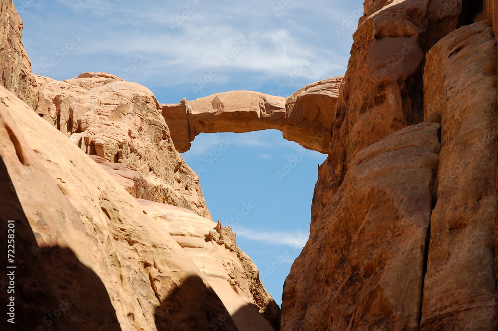 Burdah Arch over gorge  in Wadi Rum desert, Jordan.