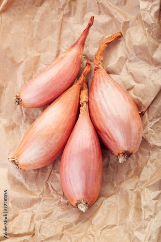 Shallot onions group on brown paper