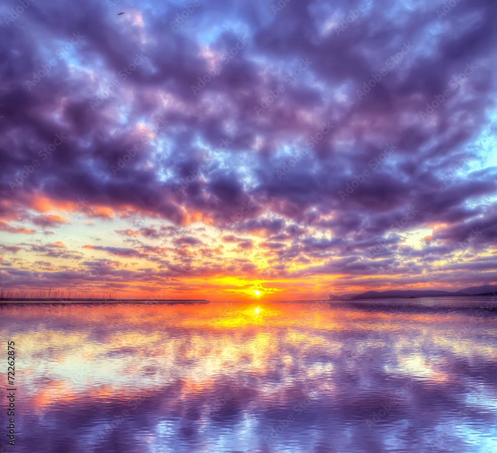 colorful sunset reflected in the water