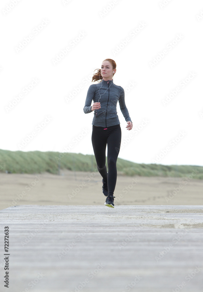 Healthy woman running alone outdoors Healthy woman running alone outdoors