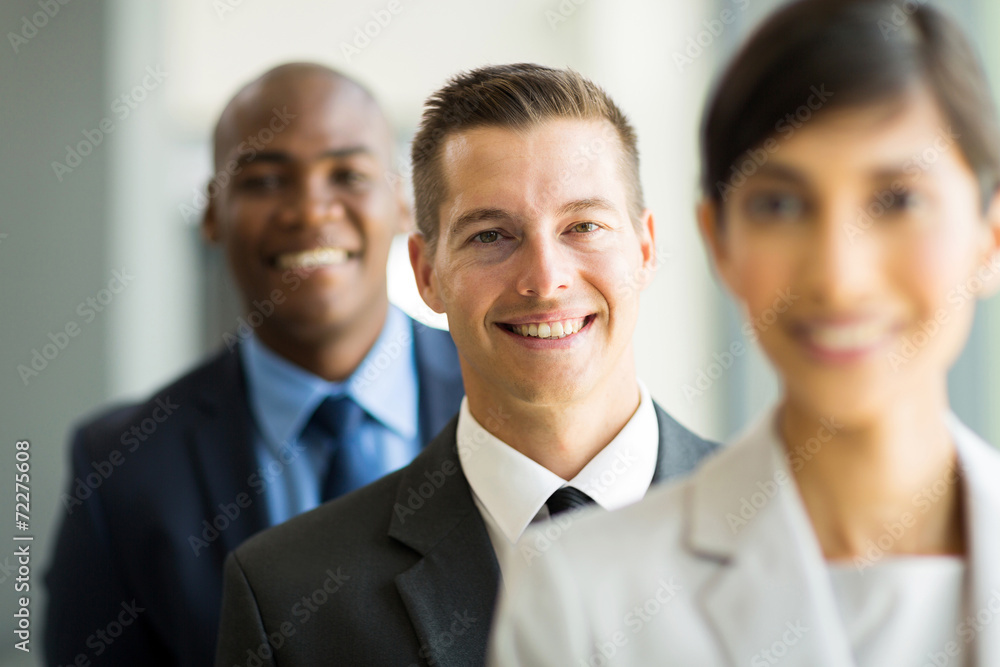 young businessman in a row with colleagues young businessman in a row with colleagues