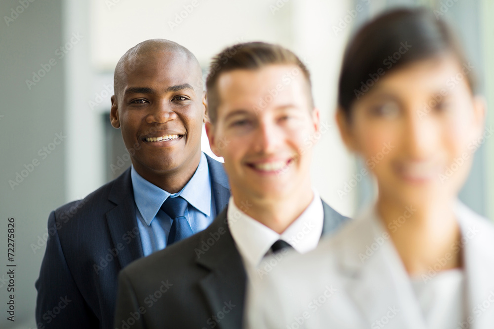 african businessman standing in a row with colleagues african businessman standing in a row with colleagues