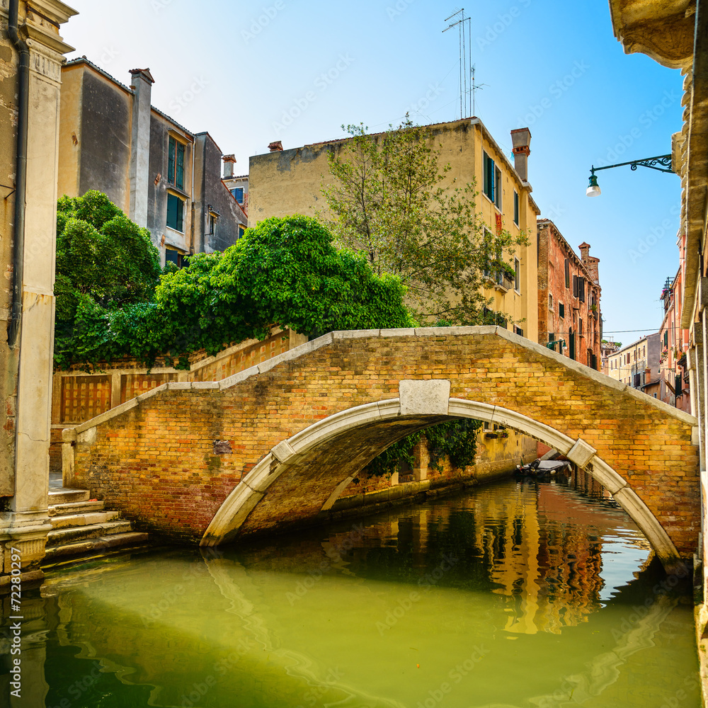 Venice cityscape, bridge, buildings and water canal. Italy