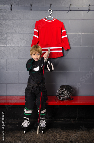 Rookie Hockey Player Getting Ready photo