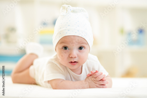 portrait of smiling baby at home