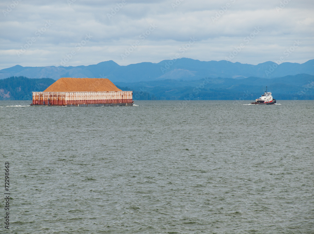 Cargo Barge on the Columbia River at Astoria Oregon USA Cargo Barge on the Columbia River at Astoria Oregon USA