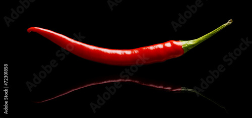 Red pepper, chilli isolated on black background