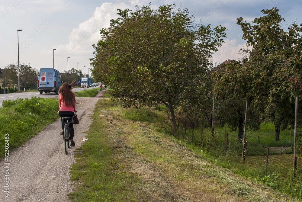 Obraz premium Girl on bicycle