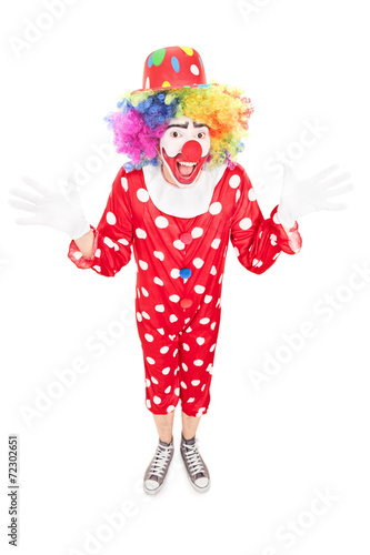 Happy male clown gesturing with hands