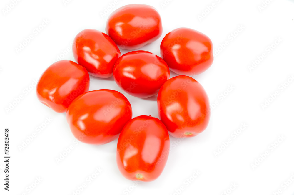 A few tomatoes isolated on white background A few tomatoes isolated on white background