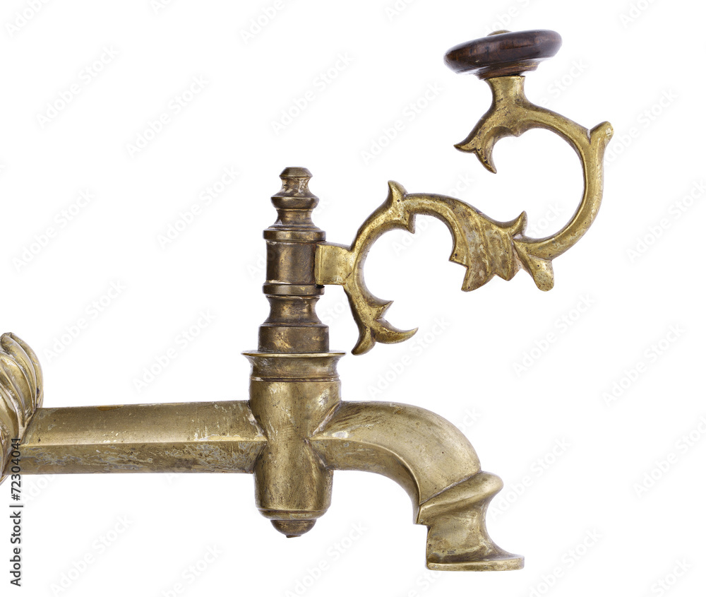 Antique tap over white isolated background