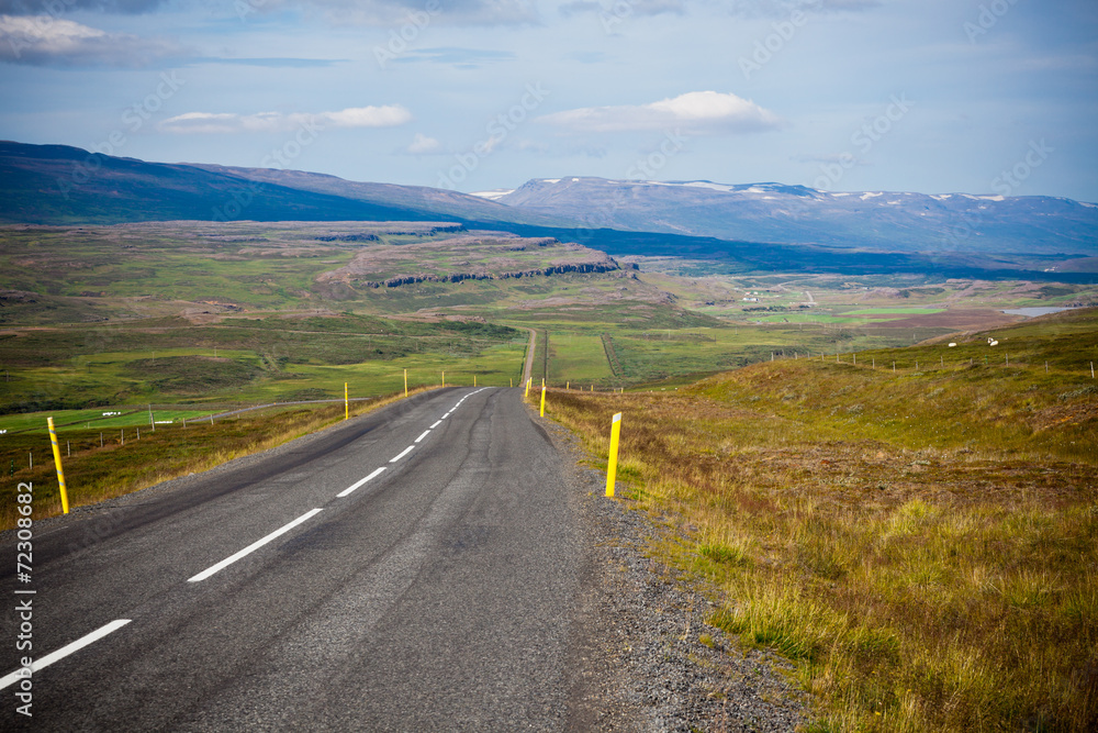 Highway through Icelandic landscape