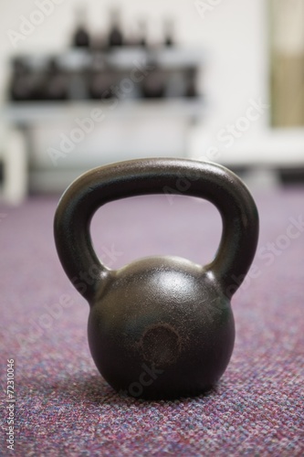 Fototapeta Naklejka Na Ścianę i Meble -  Close up of a kettle bell in gym