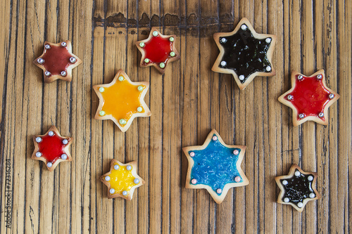 Christmas Cookies stars on wooden table