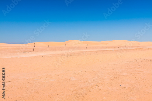Sand dunes of Sahara desert near Ong Jemel in Tozeur Tunisia.