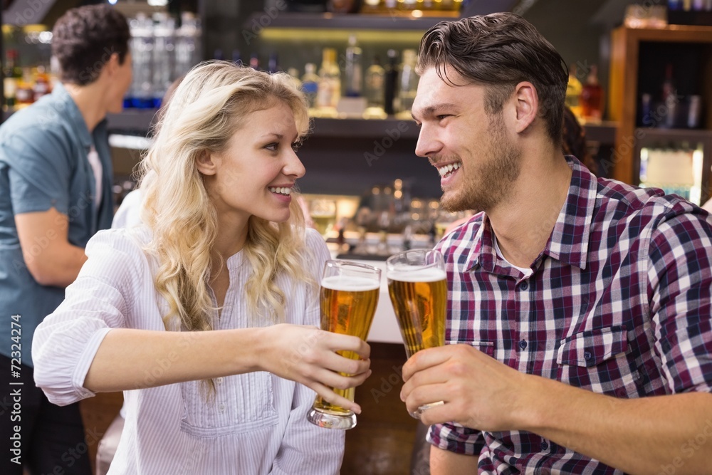 Young couple having a drink together