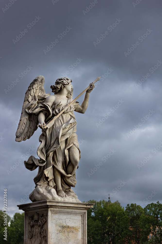 Angel statue in Rome Italy against cloudy sky