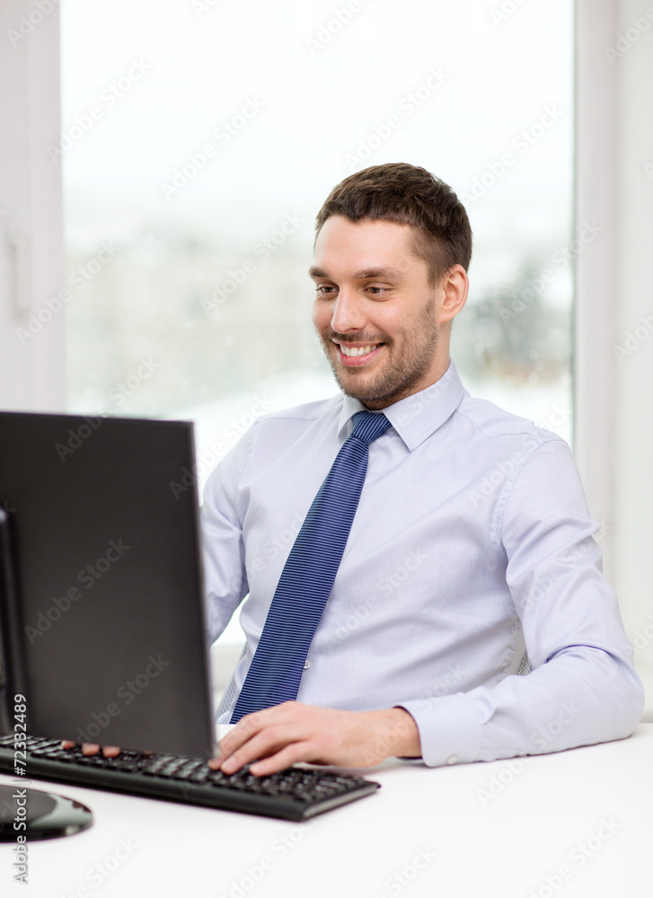 smiling businessman or student with computer smiling businessman or student with computer