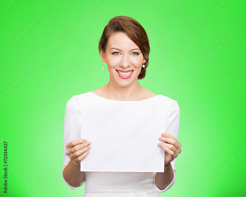 Woman holding blank paper sheet on green background Woman holding blank paper sheet on green background