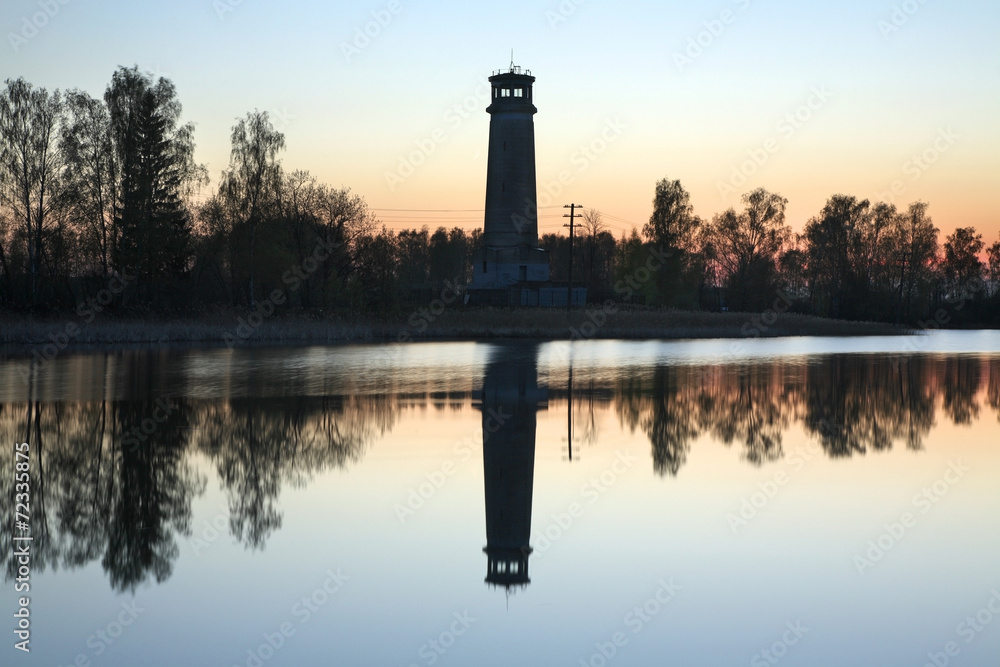 Lighthouese on swan lake in Dubna. Russia