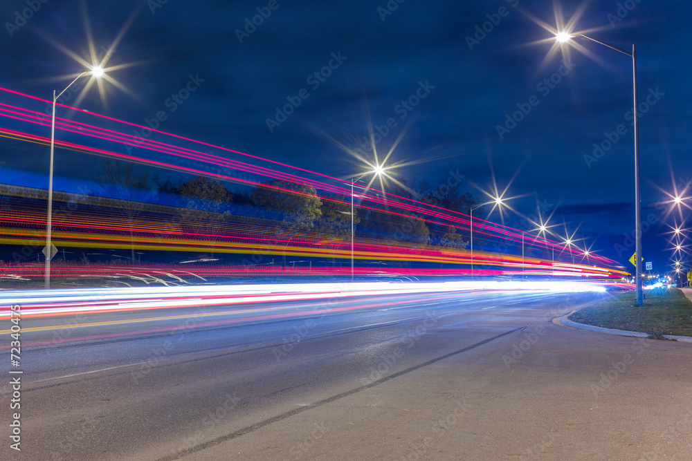 Road traffic and light trails at night - obrazy, fototapety, plakaty 