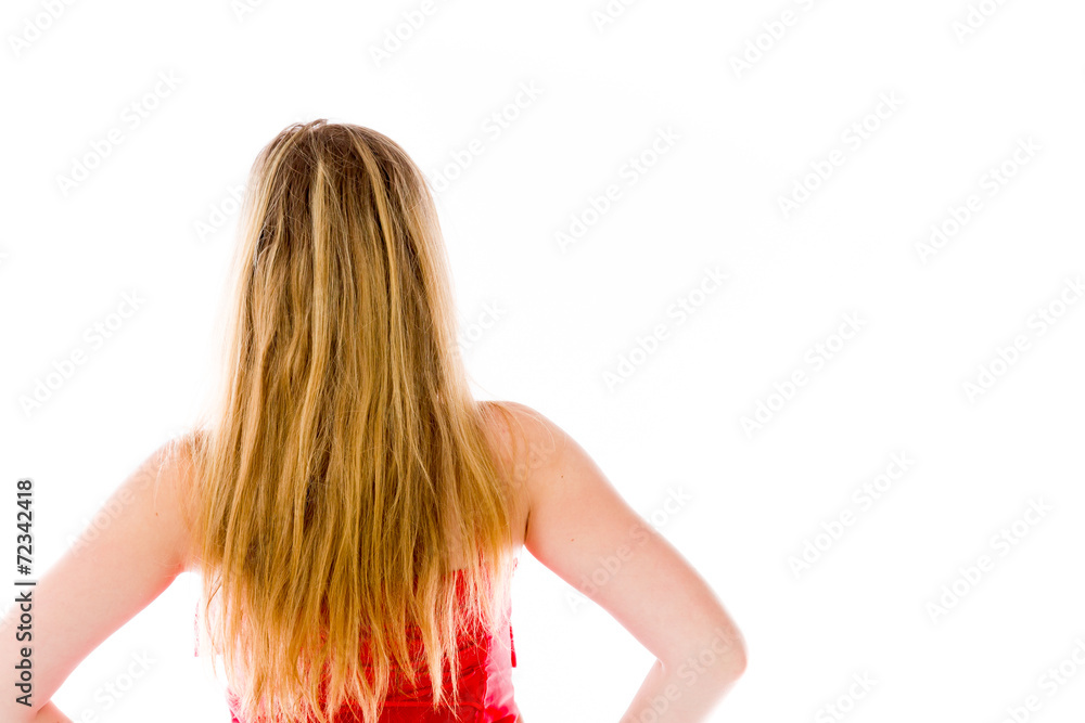 Obraz premium model isolated on plain background back hands on hips
