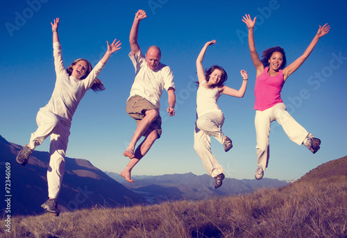 Group of People Jumping Happiness Outdoors