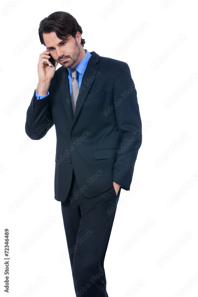 Stylish businessman talking on his mobile phone Stylish businessman talking on his mobile phone