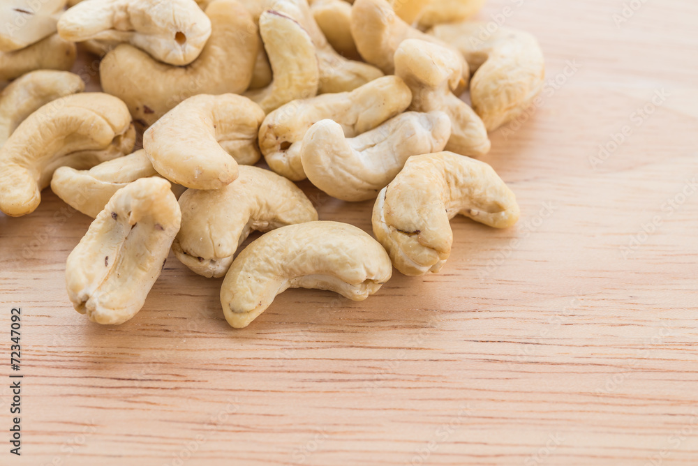 cashew on wood background cashew on wood background