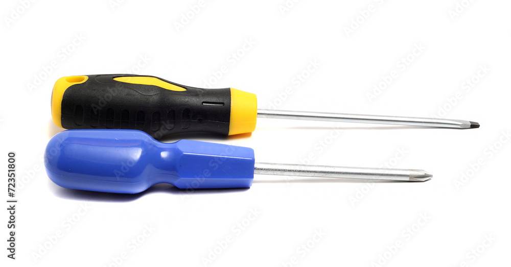 Two screwdrivers on a white background cross and direct Two screwdrivers on a white background cross and direct