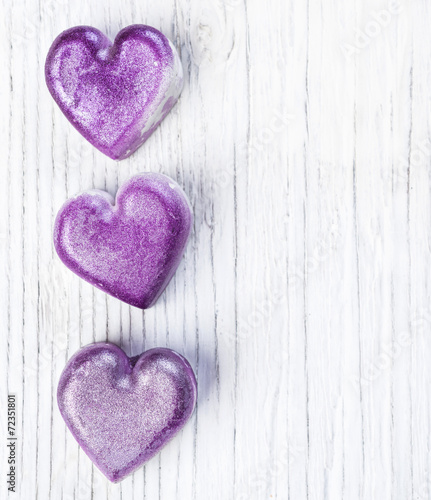 Violet heart on wood. Valentines day background