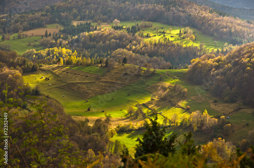 Mountain meadows at autumn illuminated by devine light © banepetkovic