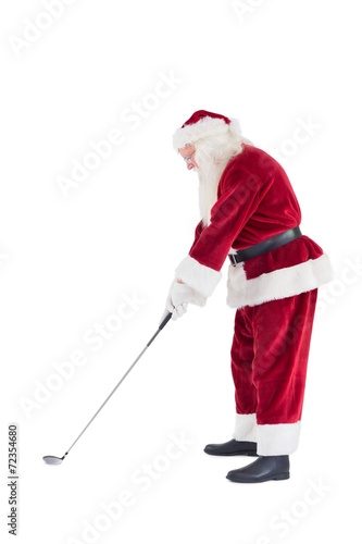 Santa Claus is playing golf
