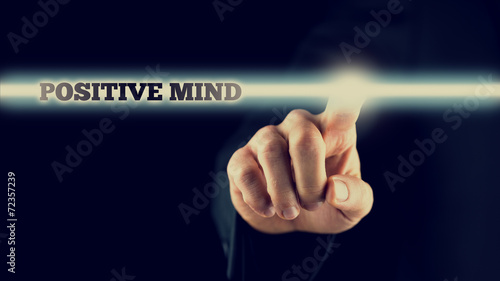 Hand Touching Positive Mind Statement on Touch Screen