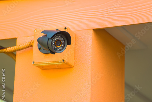 CCTV security camera outdoor at car park photo